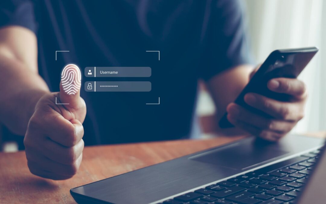 Man showing his fingerprint with username and password to signify safety which can be built by two factor authentication